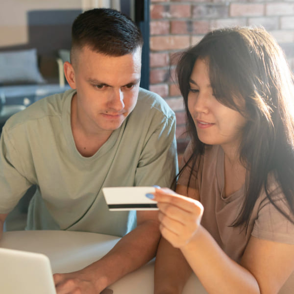 Person reviewing guaranteed loan options with a lender, discussing easy access to financing.