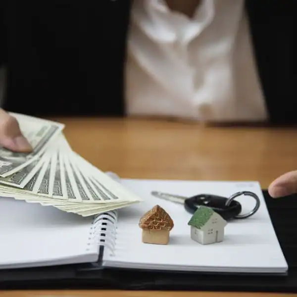 Image illustrating steps to buy a home using a mortgage, including budgeting, loan options, and closing processes.